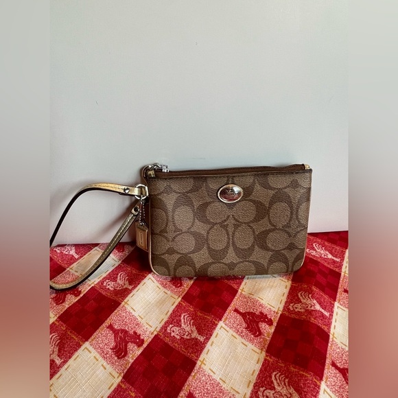 Coach Handbags - Coach Signature C Canvas Khaki Gold Wristlet Clutch Purse – EUC